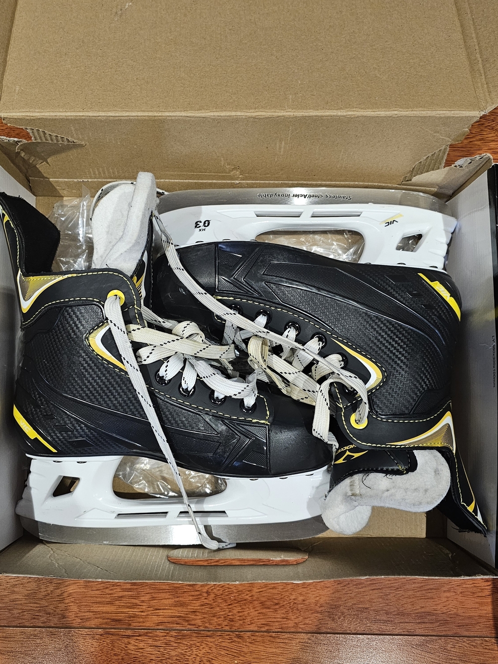 Black and Yellow Ice Hockey Skates